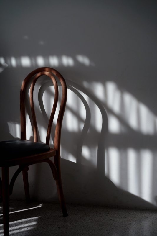 Thonet Chair and Shadow against a white wall