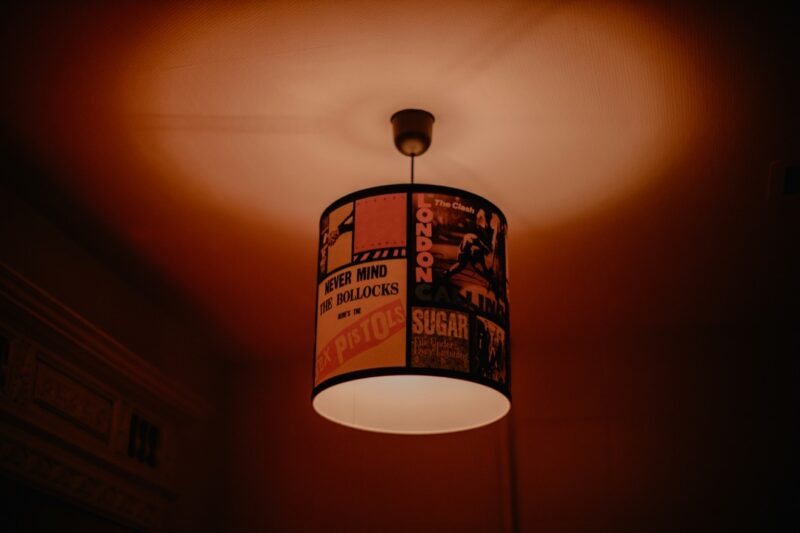 A graphic lampshade hanging from the ceiling. 